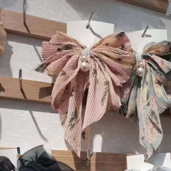 Big Bow Floral Hairpin - Image 1